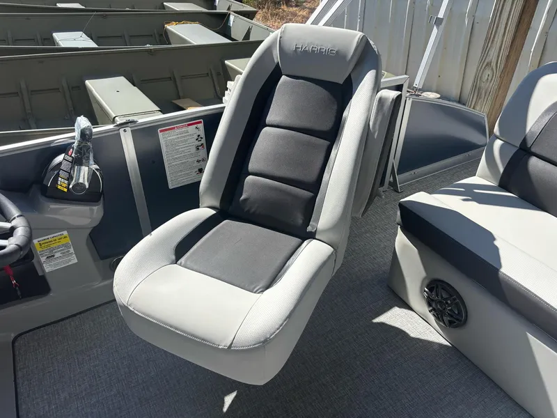 Slide: The Image of 2025 Harris Cruiser 190 boat seat, featuring sleek design and comfortable upholstery. - 2