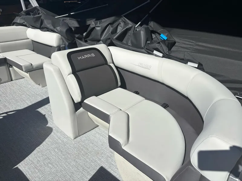 Slide: The Image of 2025 Harris Cruiser 190 boat interior with plush seating and modern design. - 4