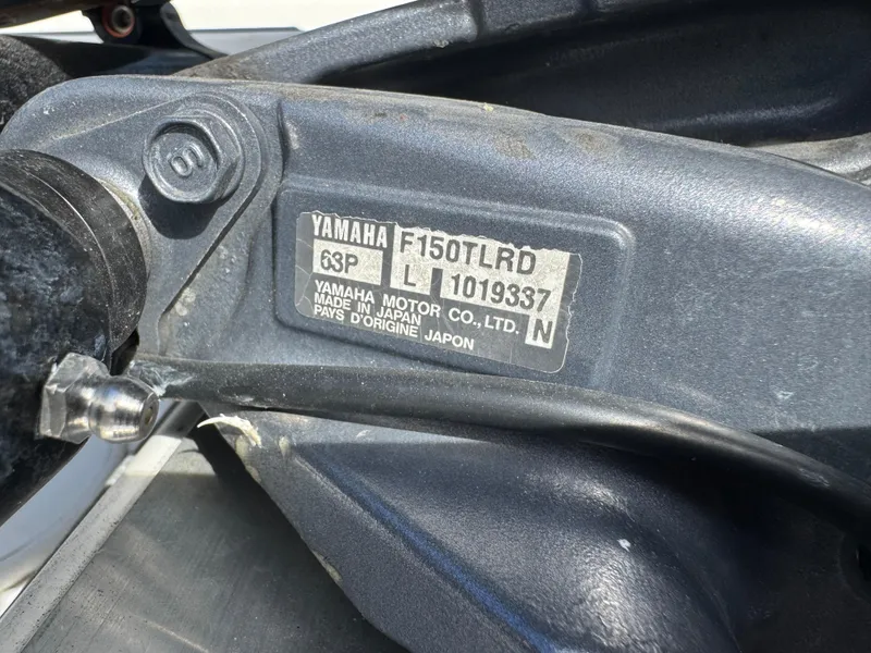 Slide: The Image of Yamaha F150TLRD engine label on 1996 Hewes 18 Redfisher boat. - 26