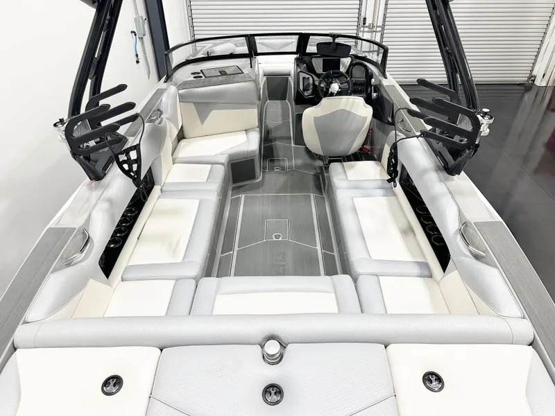 Slide: The Image of 2025 Supreme S240 boat interior with sleek seating and modern design. - 7