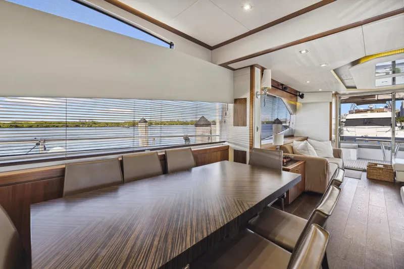 Slide: The Image of Luxurious interior of 2014 Sunseeker Manhattan 73 yacht with elegant dining area. - 16