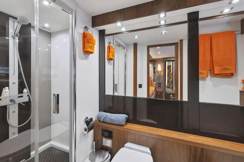 Slide: The Image of Luxurious bathroom in 2014 Sunseeker Manhattan 73 yacht, featuring modern shower and elegant design. - 29