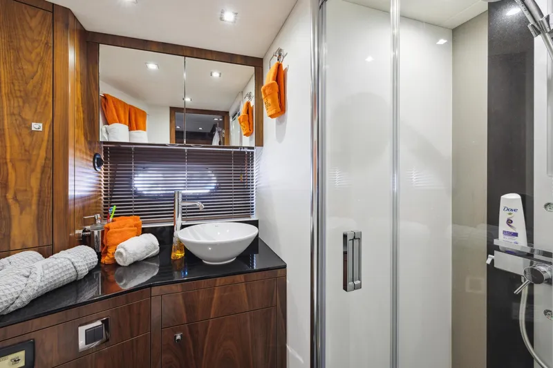 Slide: The Image of Luxurious bathroom in 2014 Sunseeker Manhattan 73 yacht with modern fixtures and elegant design. - 37