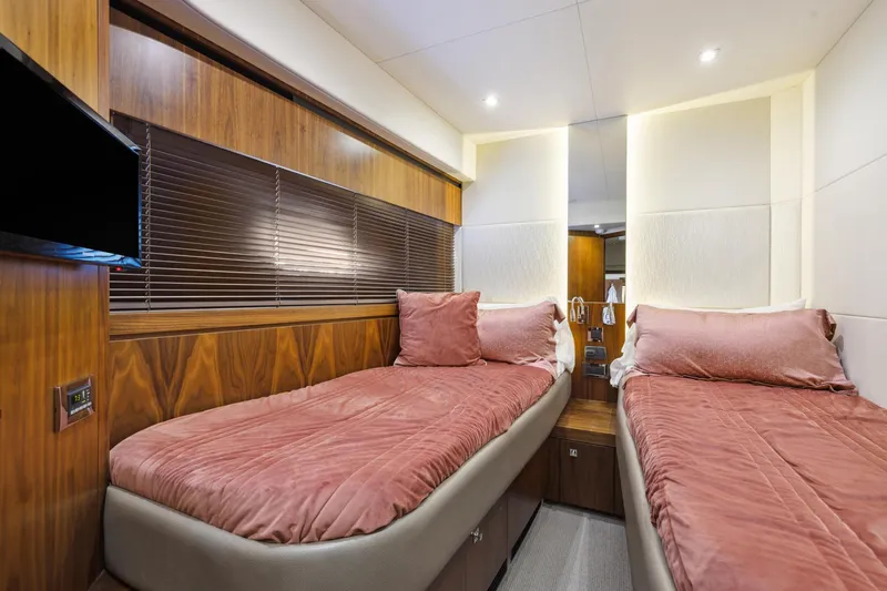 Slide: The Image of Luxurious twin cabin in 2014 Sunseeker Manhattan 73 yacht with elegant wood paneling. - 38