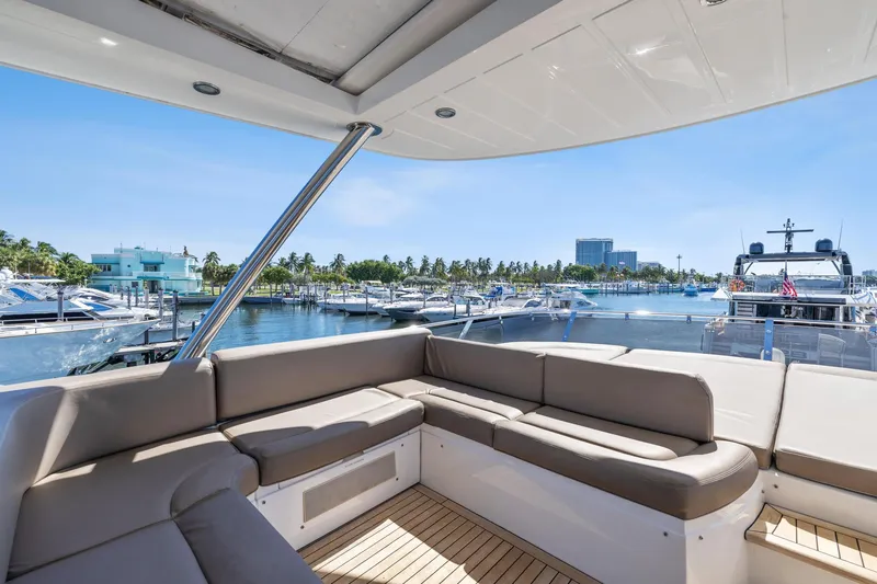 Slide: The Image of Luxurious Sunseeker Manhattan 73 yacht interior, 2014 model, docked at a scenic marina. - 5