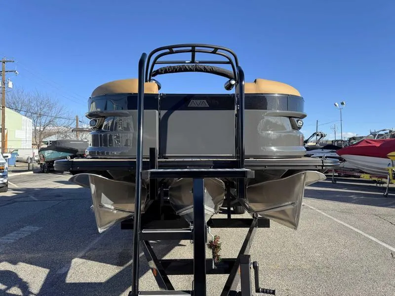 Slide: The Image of 2025 Avalon 2585 27-3 Excalibur LTD QL pontoon boat on trailer, rear view. - 4