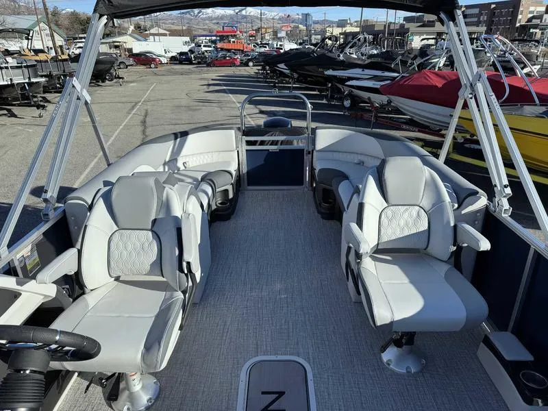 Slide: The Image of 2025 Avalon 2385 25 LSZ QL pontoon boat with spacious seating and modern design. - 10