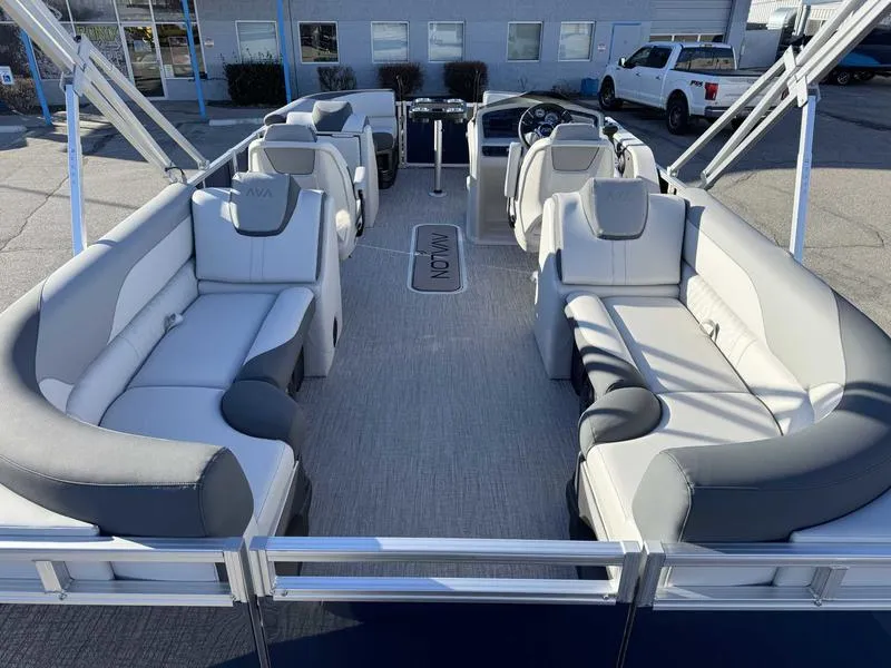 Slide: The Image of 2025 Avalon 2385 25 LSZ QL pontoon boat with spacious seating and modern design. - 2