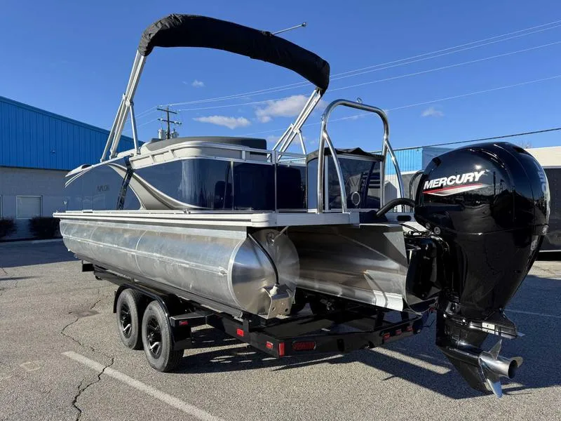 Slide: The Image of 2025 Avalon 2385 25 LSZ QL pontoon boat with Mercury outboard motor on trailer. - 5