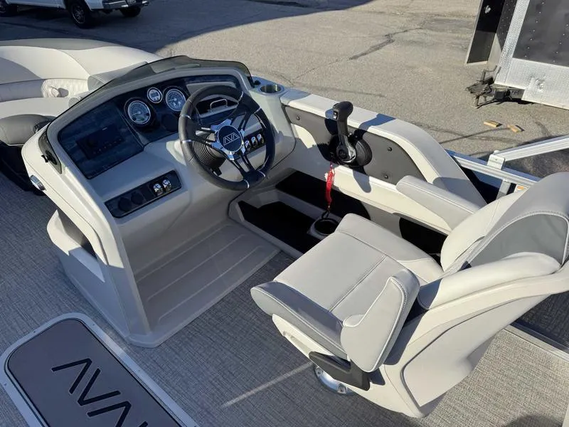 Slide: The Image of 2025 Avalon 2385 25 LSZ QL boat cockpit with steering wheel and controls. - 9