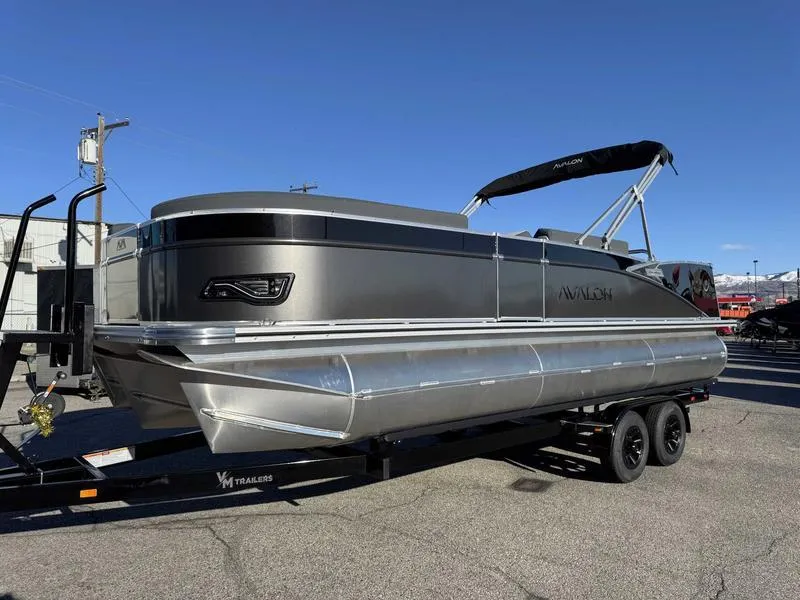 Slide: The Image of 2025 Avalon 2385 25 Catalina VRB pontoon boat on trailer, sleek design, outdoor setting. - 3