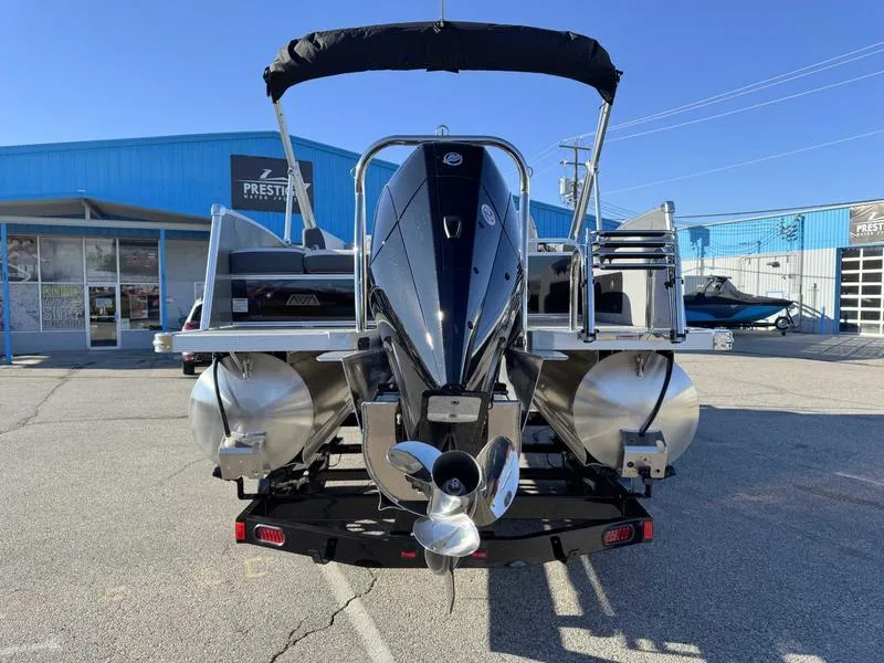 Slide: The Image of 2025 Avalon 2385 25 Catalina VRB pontoon boat, rear view, parked outdoors. - 7