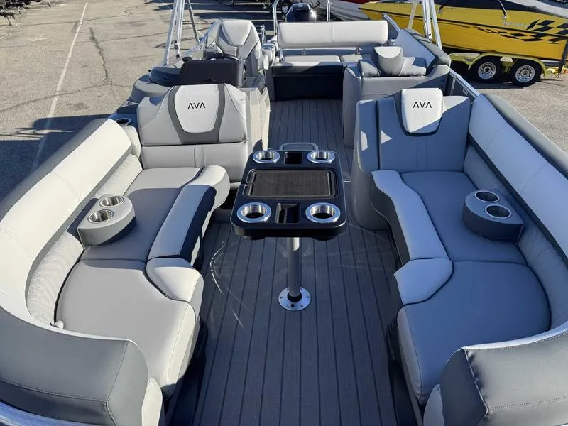 Slide: The Image of Luxurious seating on 2025 Avalon 2385 25 Catalina VRB pontoon boat, featuring modern design and cup holders. - 8