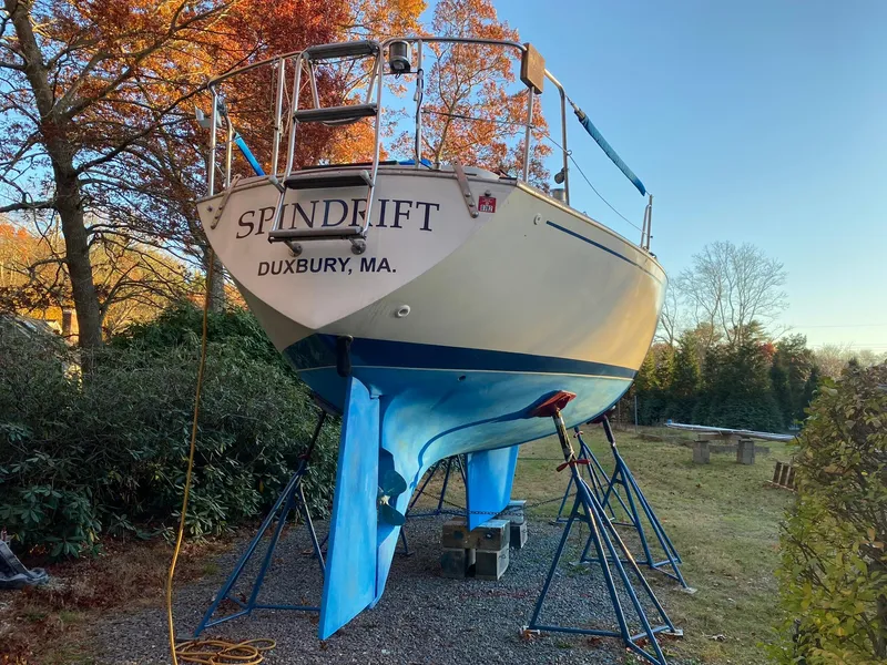 Slide: The Image of 1982 Morgan 32 sailboat "Spindrift" on stands, Duxbury, MA, autumn setting. - 11