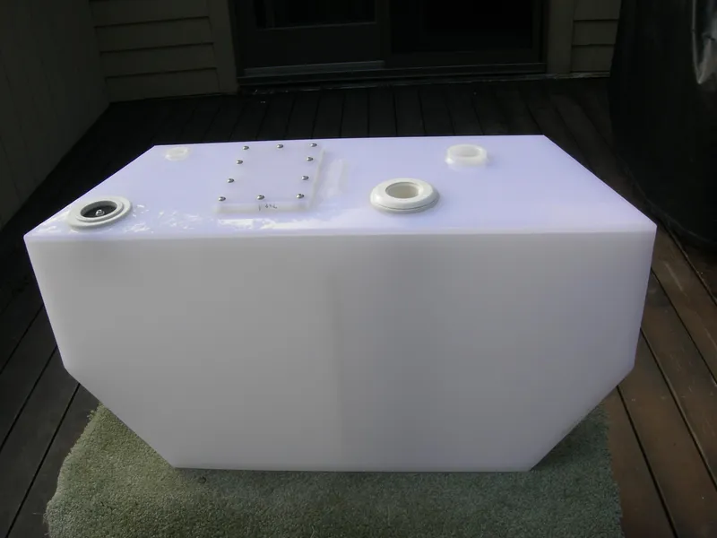 Slide: The Image of 1982 Morgan 32 boat water tank on wooden deck. - 35