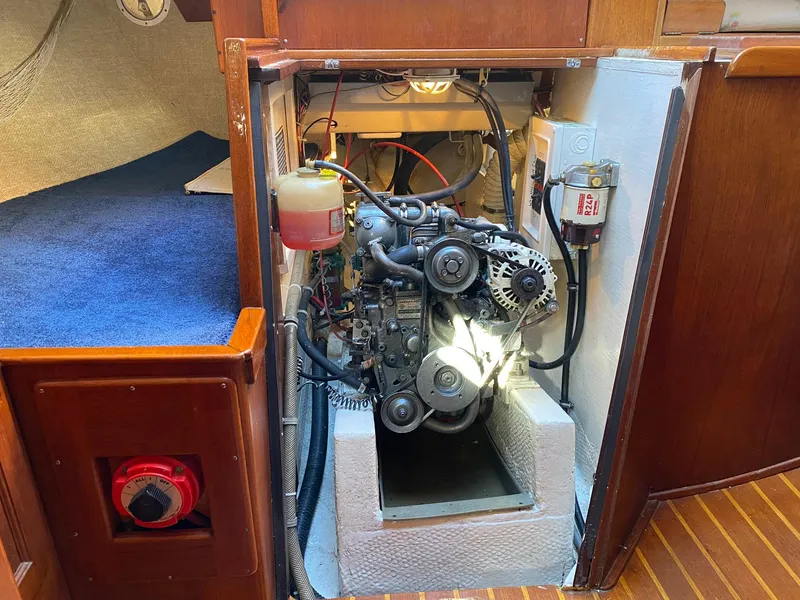 Slide: The Image of 1982 Morgan 32 engine compartment with visible components and wiring. - 38