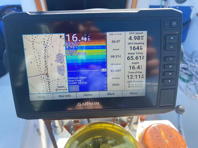 Slide: The Image of Garmin marine GPS display on a 1982 Morgan 32 sailboat, showing navigation and depth data. - 7