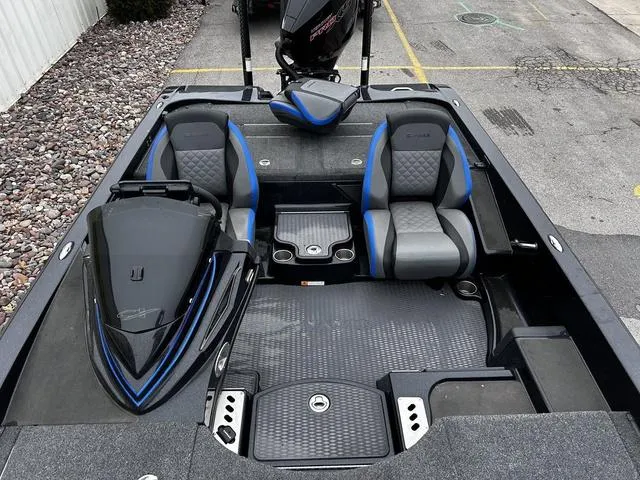 Slide: The Image of 2021 Caymas CX 21 boat interior with dual seats and sleek design. - 12