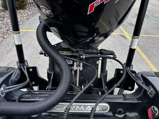 Slide: The Image of 2021 Caymas CX 21 boat engine and components, featuring detailed wiring and branding. - 15