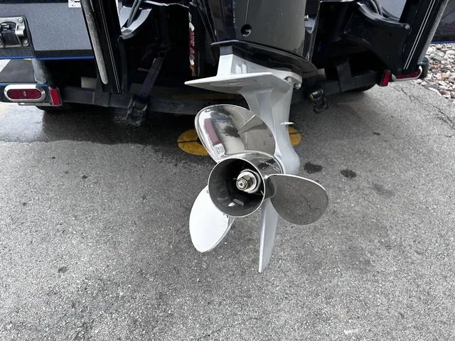 Slide: The Image of Propeller of 2021 Caymas CX 21 boat on pavement background. - 5