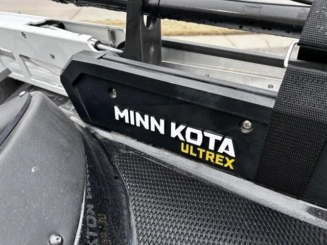 Slide: The Image of Minn Kota Ultrex trolling motor on 2021 Caymas CX 21 boat, close-up view. - 9