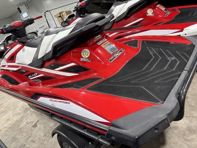 Slide: The Image of Red and white 2017 Yamaha WaveRunner GP1800 with "Supercharged" decal and visible scratch. - 3