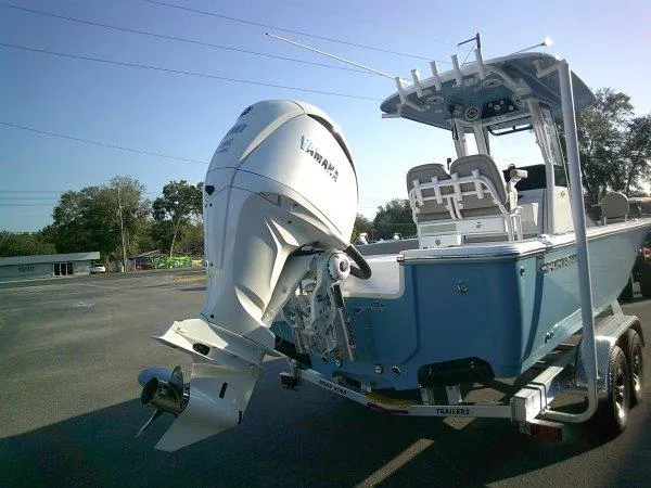 Slide: The Image of 2025 Sportsman 247 MASTERS boat with Yamaha outboard engine on trailer. - 10