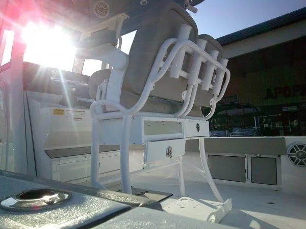 Slide: The Image of 2025 Sportsman 247 MASTERS boat interior with seating and sunlight. - 3