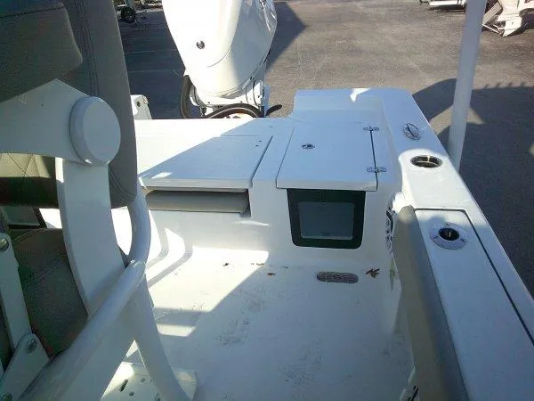 Slide: The Image of 2025 Sportsman 247 MASTERS boat interior with seating and storage compartments. - 5