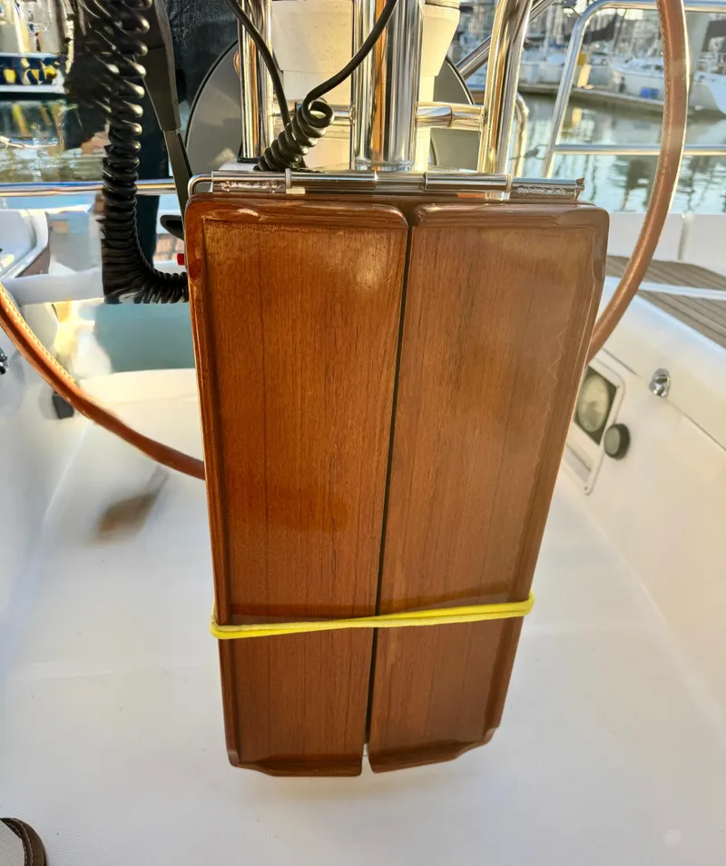 Slide: The Image of 2006 Beneteau Oceanis Clipper 343 cockpit with wooden table and steering wheel. - 35