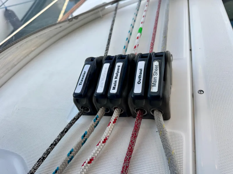 Slide: The Image of Close-up of sailing ropes and clutches on a 2006 Beneteau Oceanis Clipper 343 yacht. - 39