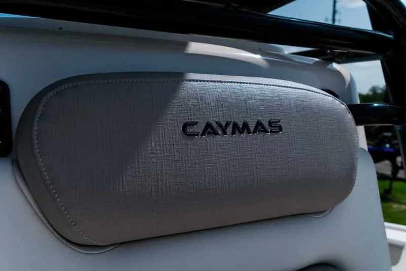 Slide: The Image of Caymas 28 HB 2025 boat detail, gray upholstery with logo. - 18