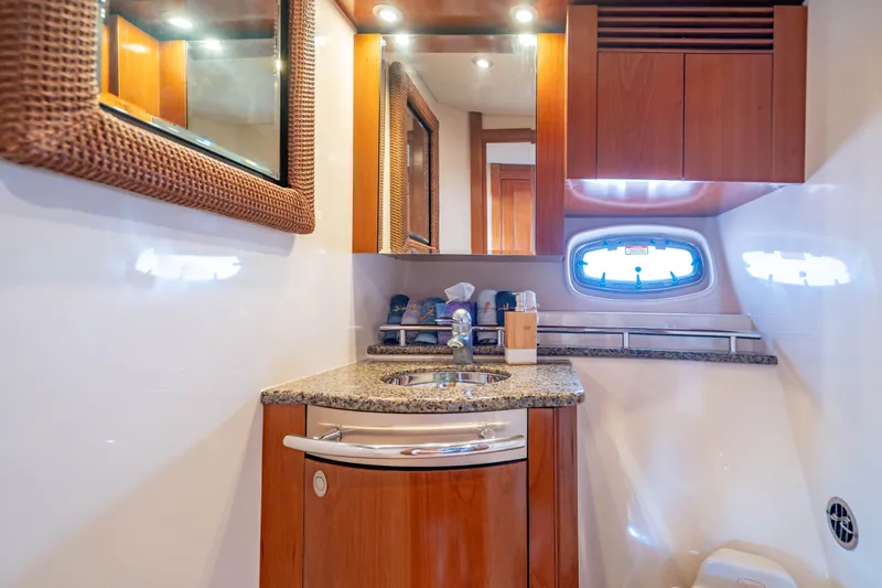 Slide: The Image of Interior of 2005 Sea Ray 48 Sundancer yacht with city skyline view. - 12