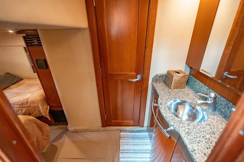 Slide: The Image of Interior of 2005 Sea Ray 48 Sundancer yacht with city skyline view. - 13