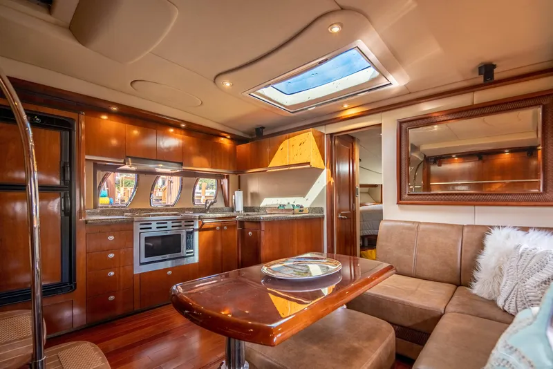 Slide: The Image of Interior of 2005 Sea Ray 48 Sundancer yacht with city skyline view. - 14
