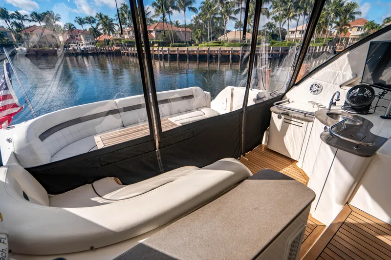 Slide: The Image of Luxurious cabin interior of 2005 Sea Ray 48 Sundancer yacht with cozy bedding. - 19