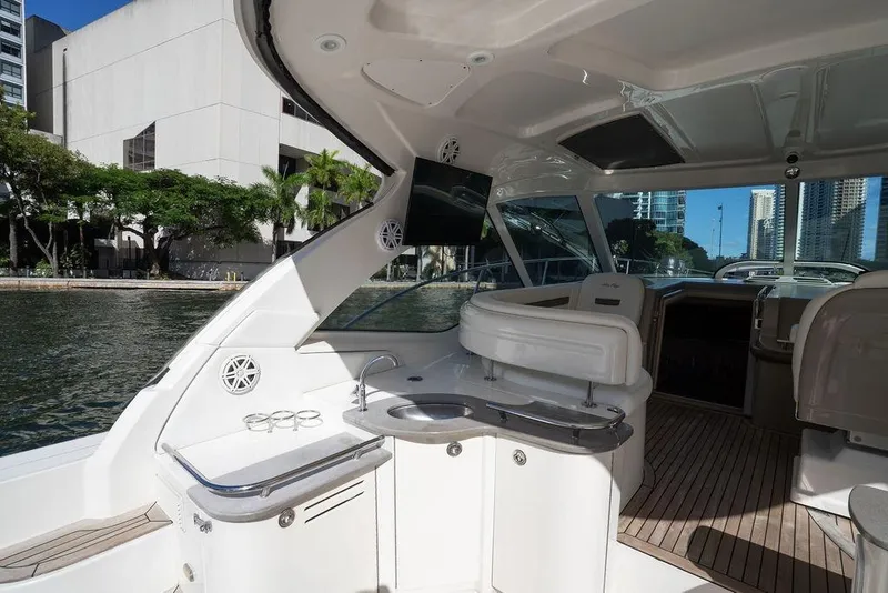 Slide: The Image of Luxurious 2005 Sea Ray 48 Sundancer yacht interior with sleek design and waterfront view. - 42