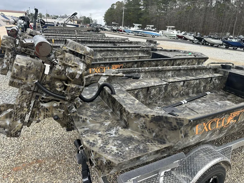 Slide: The Image of 2025 Excel Shallow Water F4 1754 F86 HDR5000 boats in camouflage design, displayed outdoors. - 7