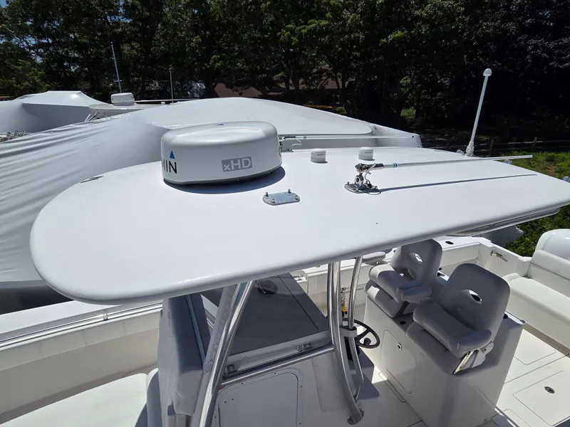 Slide: The Image of 2016 Contender 32 ST boat with radar equipment and seating, viewed from above. - 19