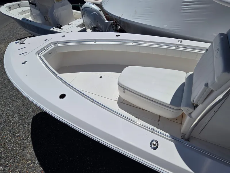 Slide: The Image of 2016 Contender 32 ST boat interior with seating and clean deck design. - 20
