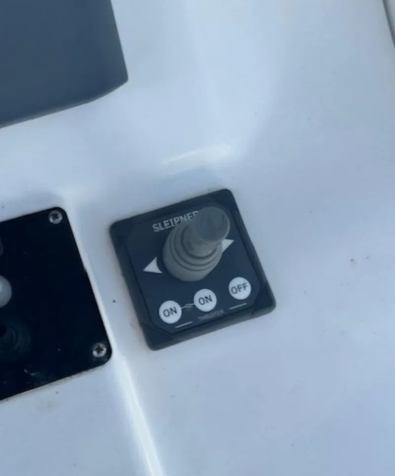 Slide: The Image of Joystick control panel on a 2016 Contender 32 ST boat. - 4