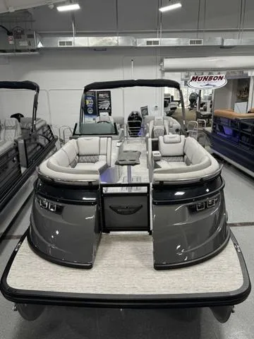 Slide: The Image of 2025 Bennington Q Quad Bench 25 QFB pontoon boat in showroom. - 12