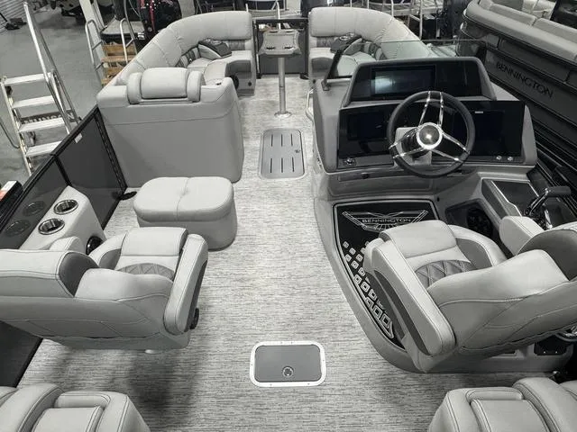 Slide: The Image of Interior of 2025 Bennington Q Quad Bench 25 QFB pontoon boat with luxurious seating. - 18