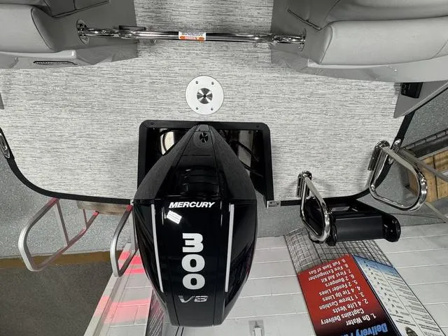 Slide: The Image of 2025 Bennington Q Quad Bench 25 QFB with Mercury 300 V8 engine, interior view. - 32