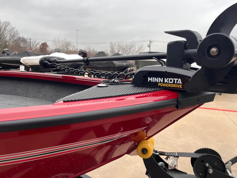Slide: The Image of Red 2025 Ranger VS1665SC boat with Minn Kota PowerDrive trolling motor. - 2