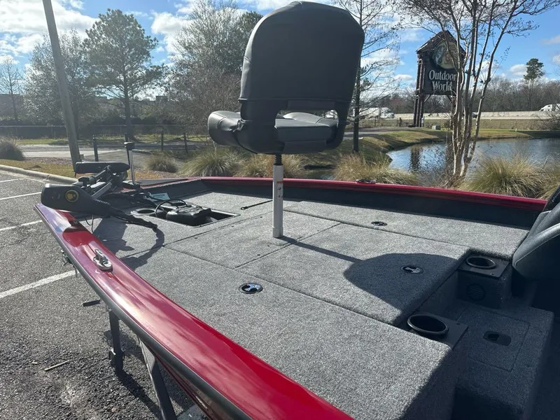Slide: The Image of 2025 Tracker Pro Team 175 boat with fishing seat and equipment on deck. - 4