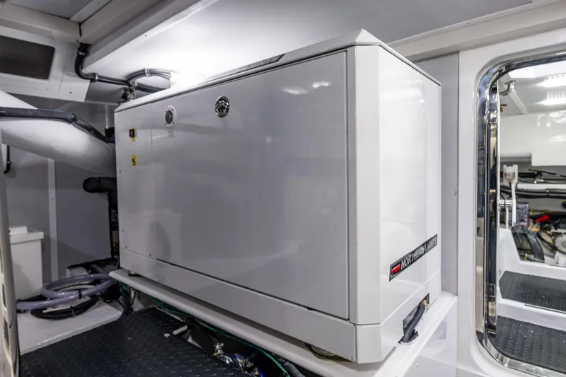 Slide: The Image of Modern engine room with Northwest 58 equipment, 2026 model, featuring sleek white design and advanced technology. - 12