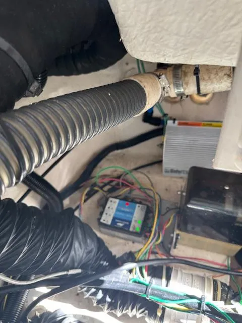 Slide: The Image of 2014 Regal 28 Express engine compartment with wiring and components visible. - 29