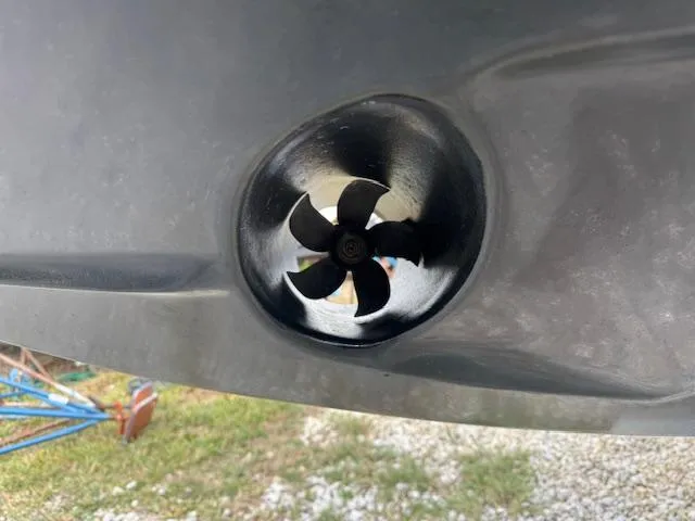 Slide: The Image of Bow thruster on a 2014 Regal 28 Express boat hull. - 8