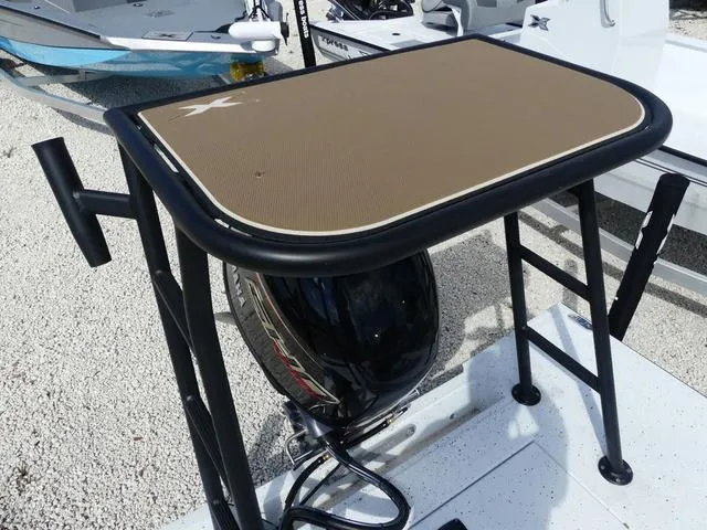 Slide: The Image of 2025 Xpress Boats Skiff 185 with motor and fishing platform. - 15